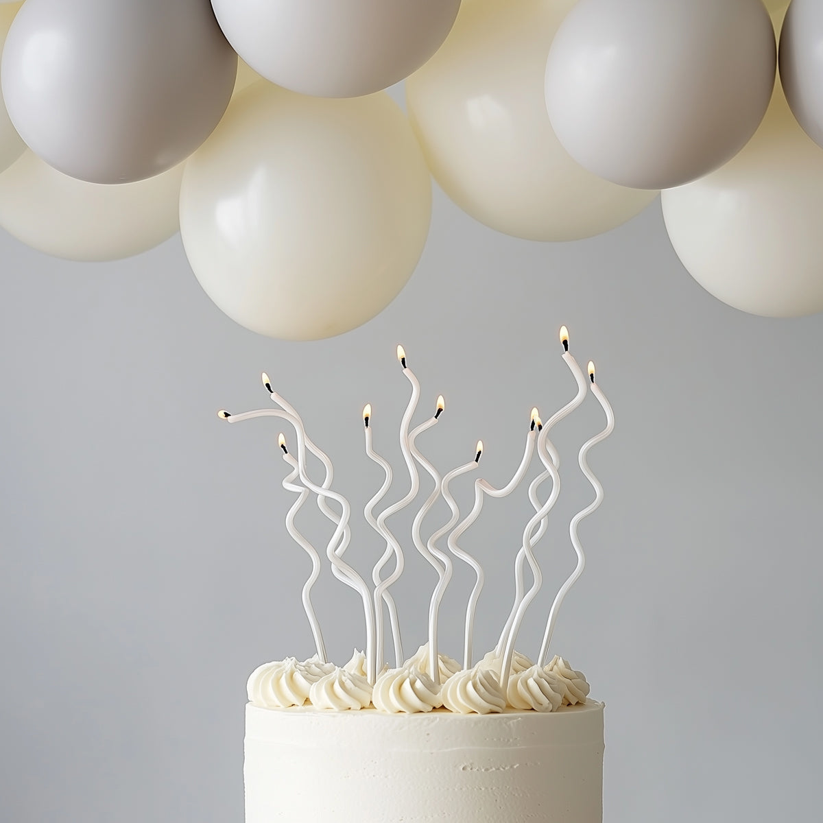 White 13cm Swirly Cake Candles (Pack of 16)